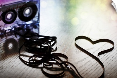 Spilled cassette tape symbolizing the love of old school mix tapes and all things analog