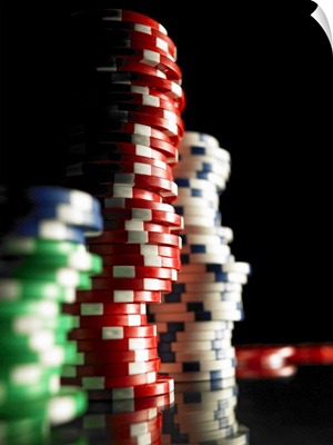 Stacks of gambling chips, close-up (focus on red chips)