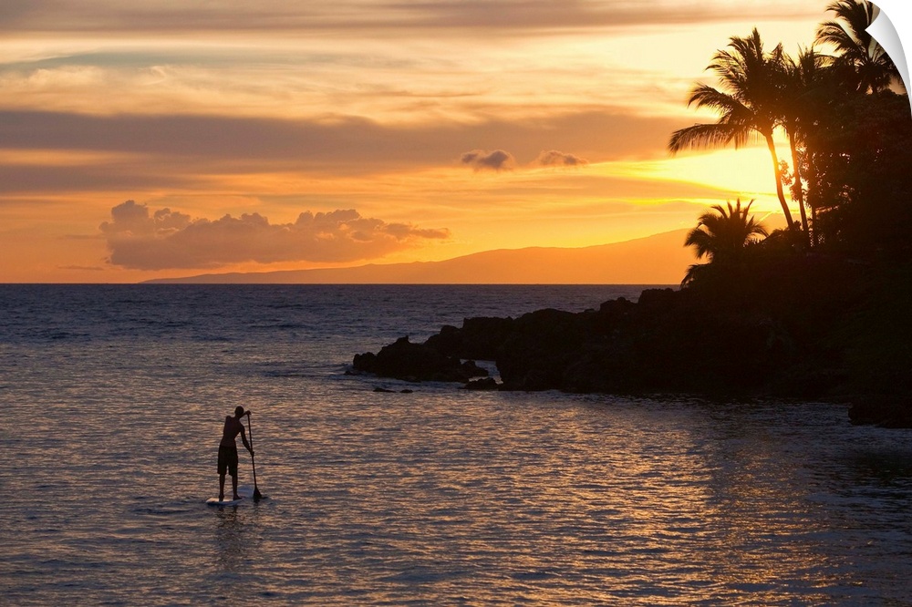 Man stand-up paddling at sunset in south Maui at Makena, Maui, Hawaii MR