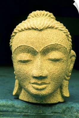 Stone head of Buddha Gold