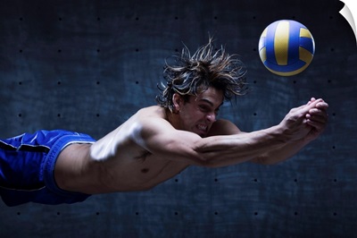 Studio shot of volleyball player playing
