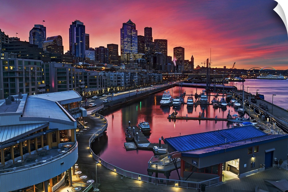 Big canvas photo art of downtown Seattle meeting a harbor with a vibrant sunset in the distance.
