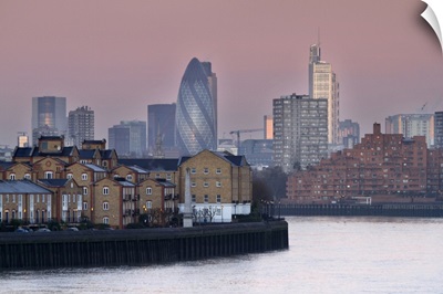Sunrise on River Thames towards City of London from Canary Wharf and Docklands.