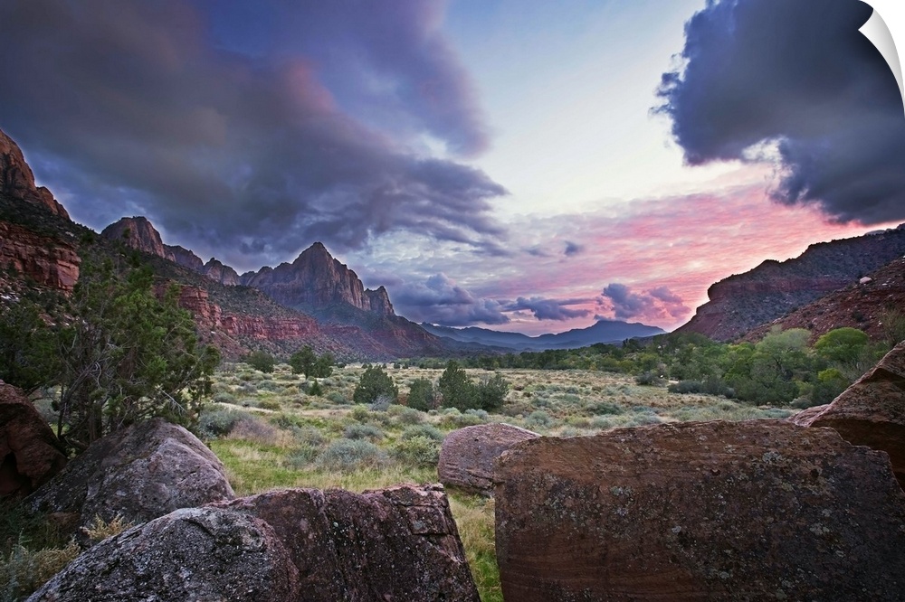 The sun sets with red clouds in Zion National Park