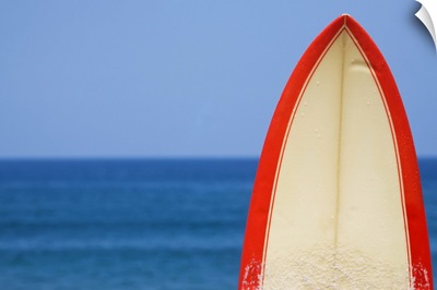 Surfboard in front of sea on Las Canteras beach in Las Palmas de Gran Canaria.