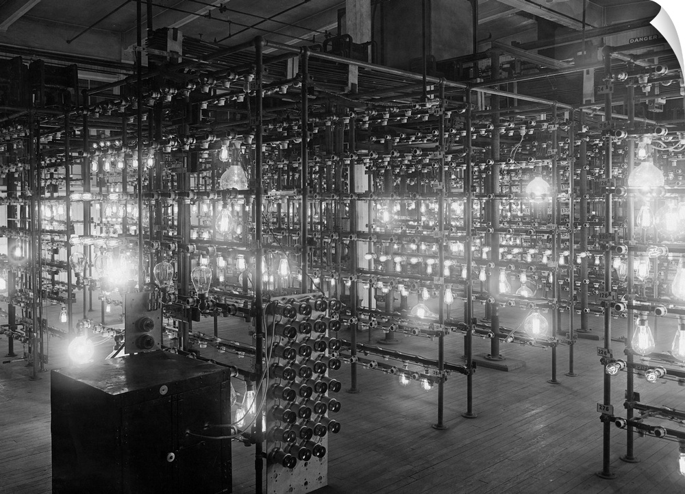 Racks of light bulbs are tested for lasting power at the Harrison Lamp Works.