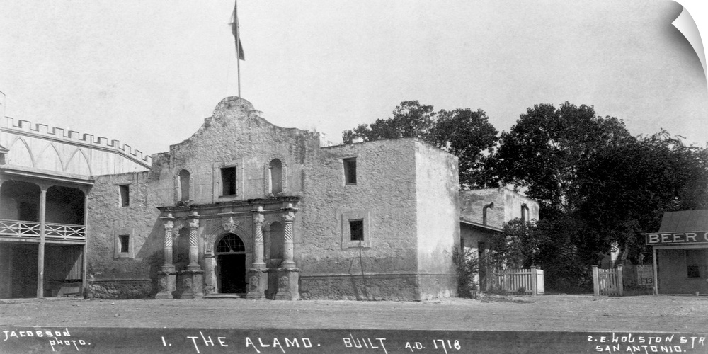 A flag flies over the Alamo, a Spanish Franciscan mission and Texan fort.