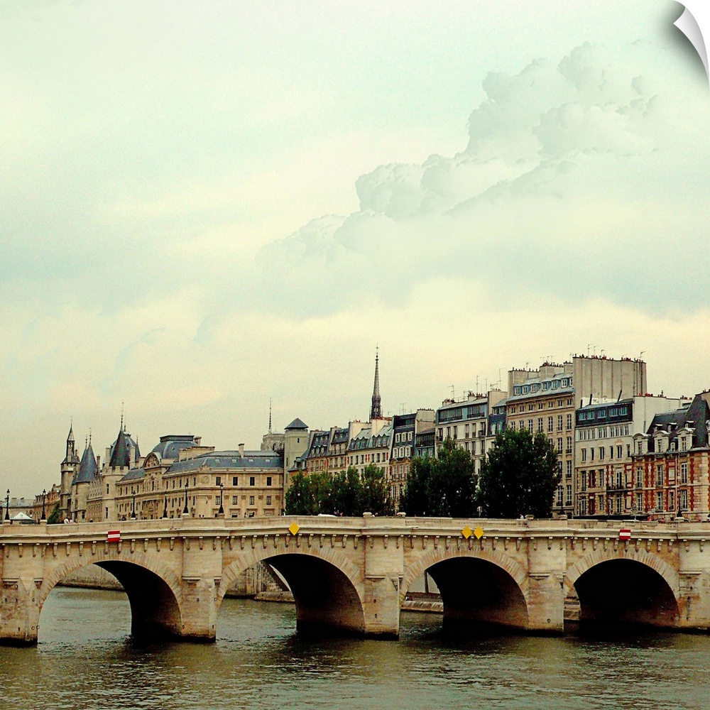The many bridges crossing the Seine River in Paris France.