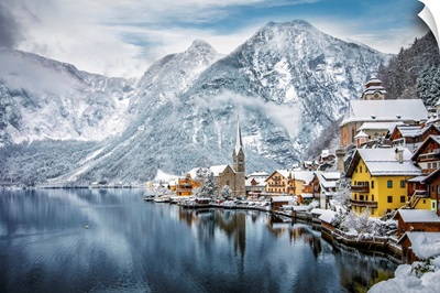 The Snow Covered Village Of Hallstatt In The Austrian Alps
