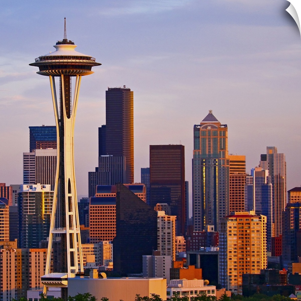 The Space Needle is a tower at dusk in Seattle, Washington.