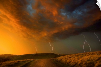 Thunderstorm And Orange Clouds At Sunset