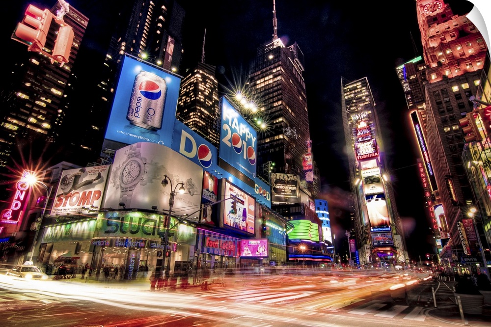Night photograph of the bright lights of Times Square in New York City, New York.