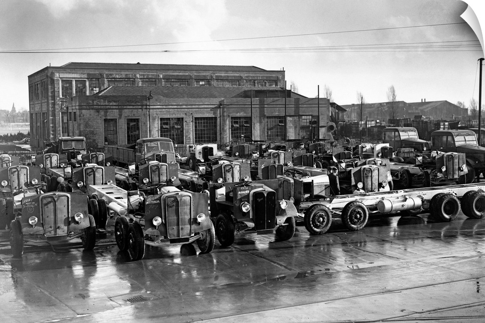 Bus and goods vehicle chassis wait outside the Associated Equipment Company factory in Southall to be exported. This compa...