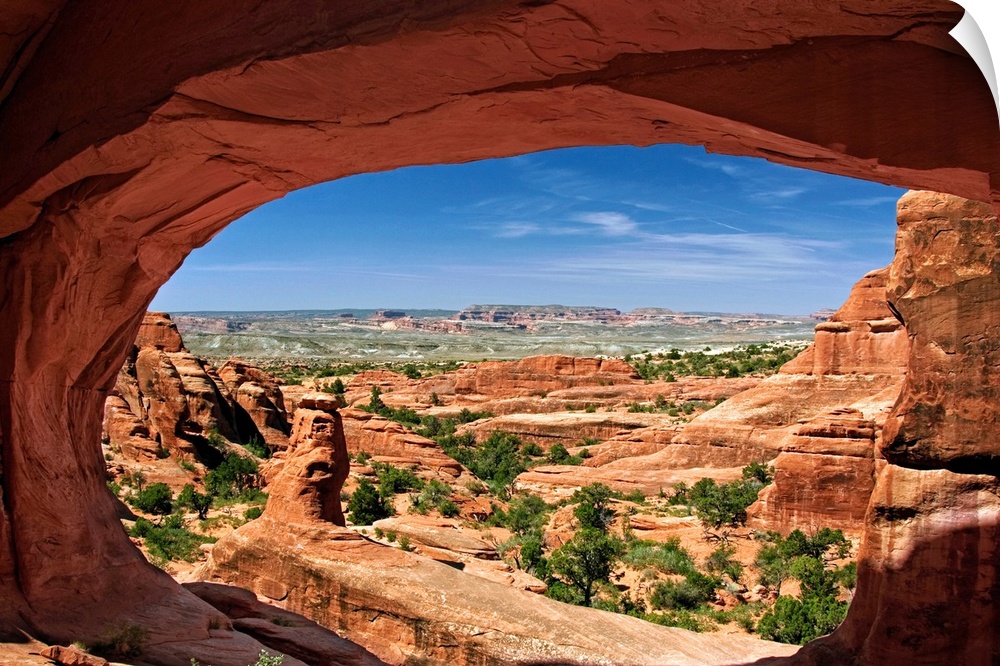 View of Arches National Park looking through Tower Arch.