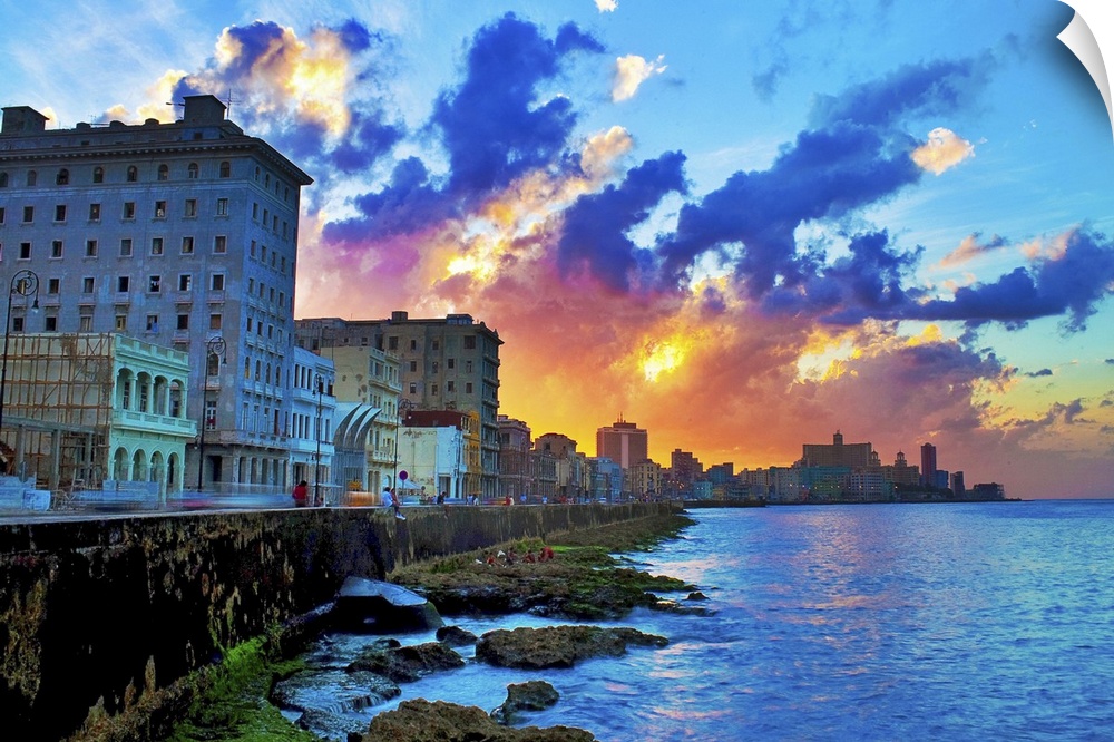 View of buildings and sea during sunset in Cuba.