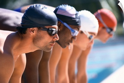 view of male swimmers at the start of a race