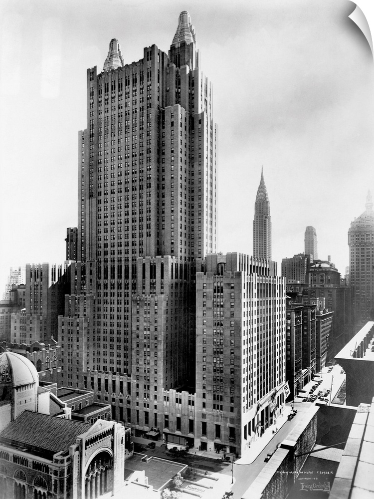 A view of the Waldorf-Astoria hotel with St. Bartholomew's Church in the foreground. ca. 1930-1950, New York City.