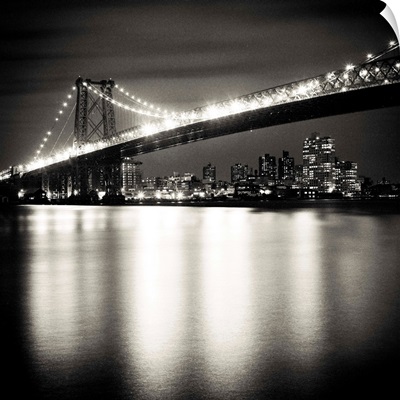 Williamsburg bridge in New York City at night.