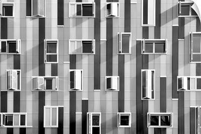 Windows in modern building with unusual distribution.