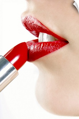 Woman Applying Red Lipstick