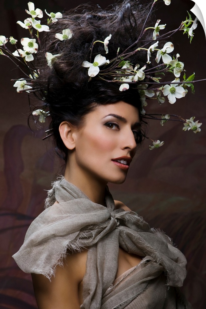 Beautiful woman with flowering twigs in hair