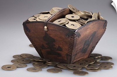 Wooden box full of ancient Chinese coins