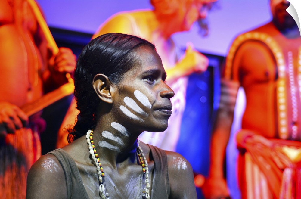 Yirrganydji Aboriginal woman and men during cultural show in Queensland, Australia.