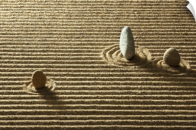 Zen stone on sand