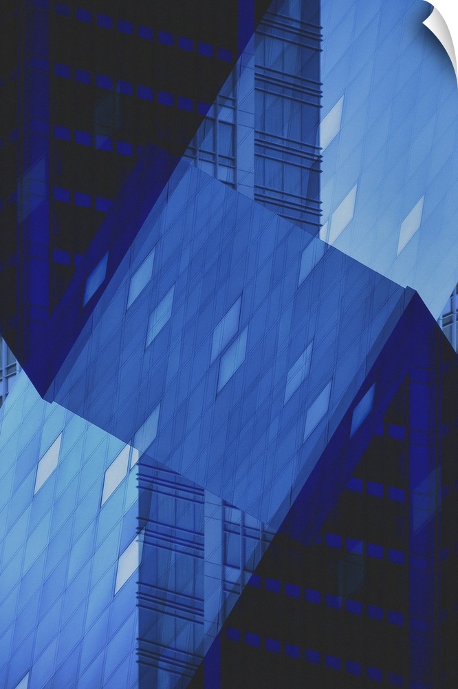 Blue abstract art of a building folded into different angles and placed all together as one.