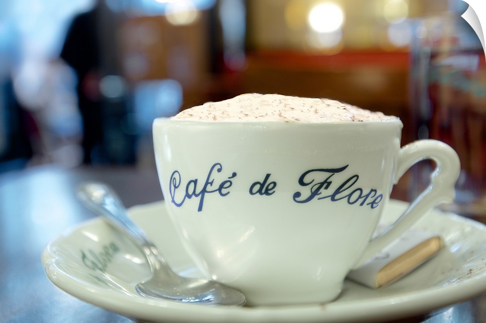 A close up photograph of a cup of coffee from Cafe de Flore in Paris.