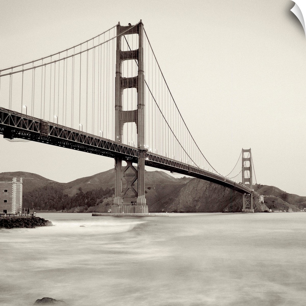 A black and white photograph of the Golden Gate Bridge in San Francisco.