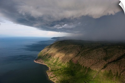 A thunderstorm moves over the eastern shore of Lake Albert
