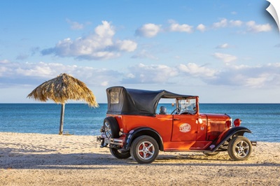 A Classic Car On A Beach In Playa Ancoa, In Trinidad, Sancti Spiritus, Cuba
