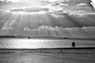 A Couple Walk Along The Plage Du Mole At Sunset, St. Malo, Brittany, France