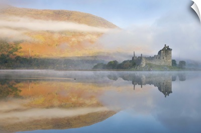 A misty morning beside Loch Awe with views to Kilchurn Castle, Scotland