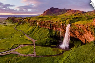 Aerial drone view of Seljalandsfoss waterfall at sunset, Iceland