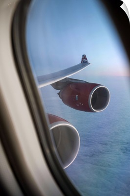 Airbus A340 aircraft, view out of the window with engine and wing