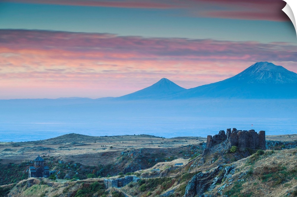 Armenia, Aragatsotn, Yerevan, Amberd fortress located on the slopes of Mount Aragats, with Mount Ararat in the distance