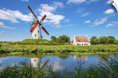 Belgium, West Flanders, Damme. Hoeke Mill windmill on the Damse Vaart canal