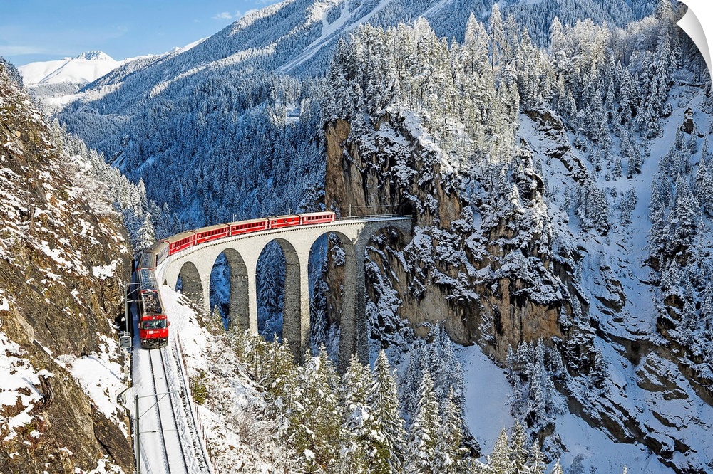 Bernina train at Landwasser viaduct, Unesco world heritage, Engadine, Switzerland.