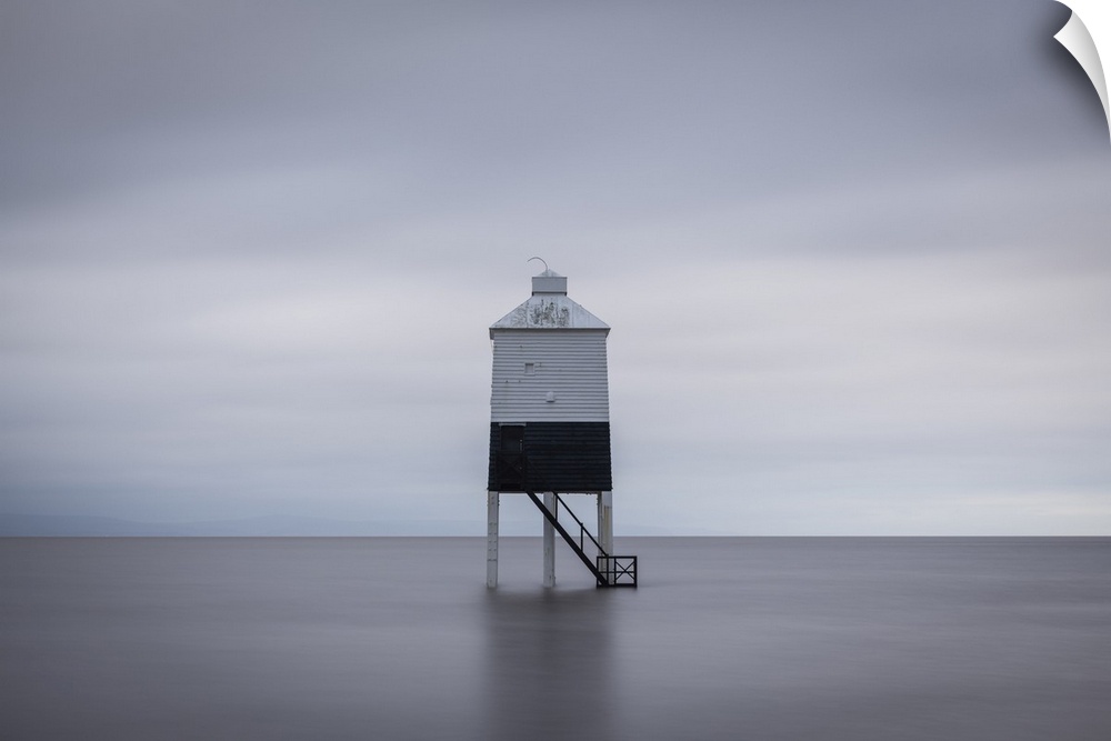 Burrnham's stilted Low Lighthouse at high tide, Burnham on Sea, Somerset, England.  Winter (February) 2023.