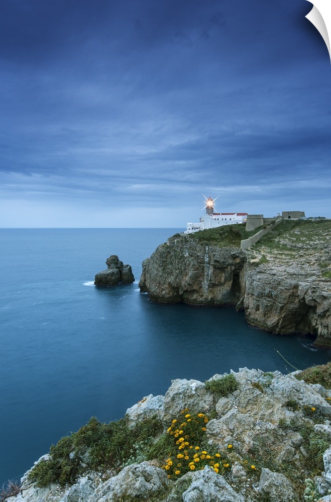 Cabo de Sao Vicente (Cape St. Vincent) and the lighthouse at dusk. The southwesternmost lighthouse in continental Europe. ...