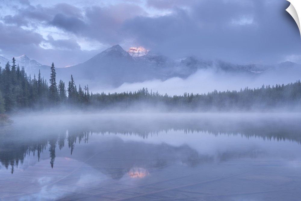Misty morning in the Canadian Rockies, Herbert Lake, Banff National Park, Alberta, Canada. Autumn (September) 2016.