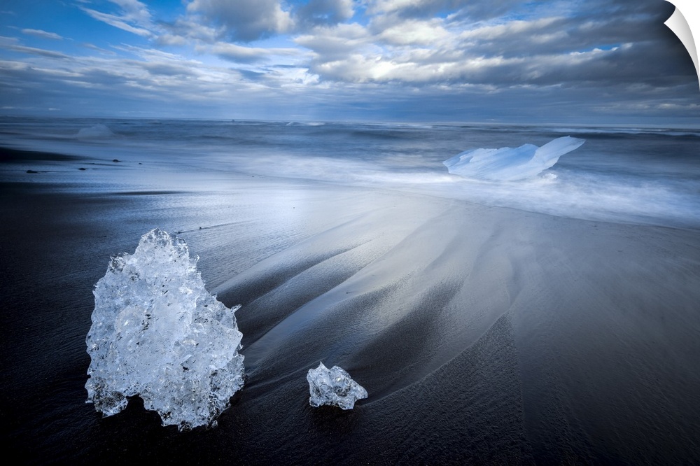 Chunks of ice on shore at Diamond beach near Jokulsarlon glacier lagoon, South Iceland, Iceland.