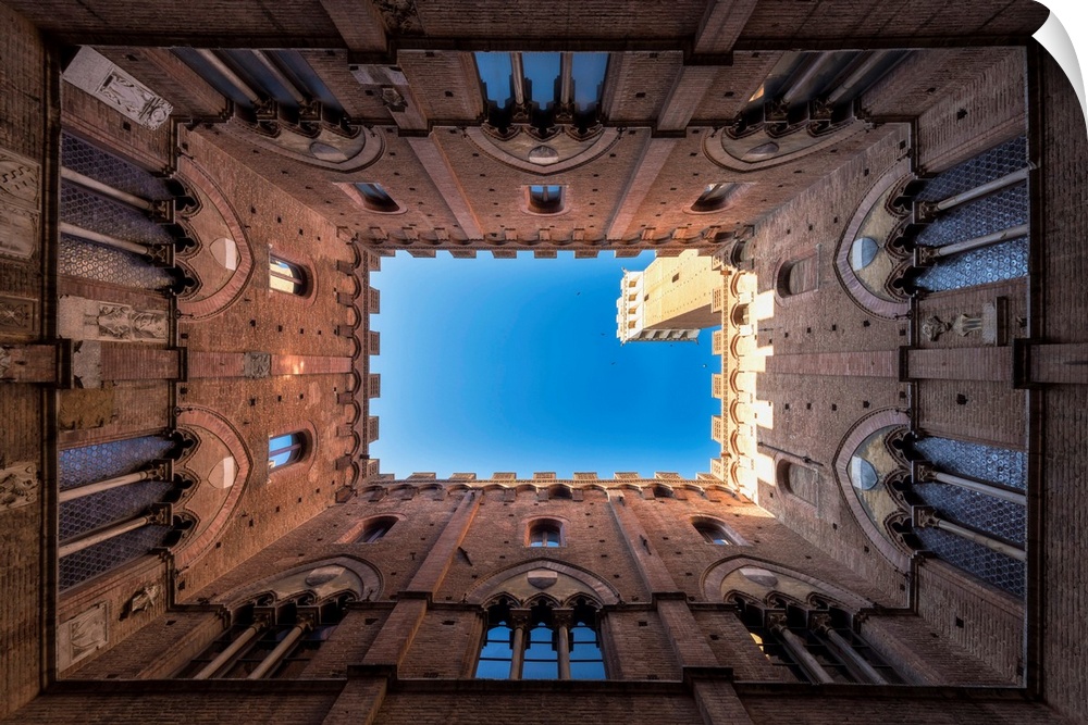 Siena, Tuscany, Italy, Europe. Classic Bottom View Of Palazzo Pubblico With Del Mangia's Tower At Dawn