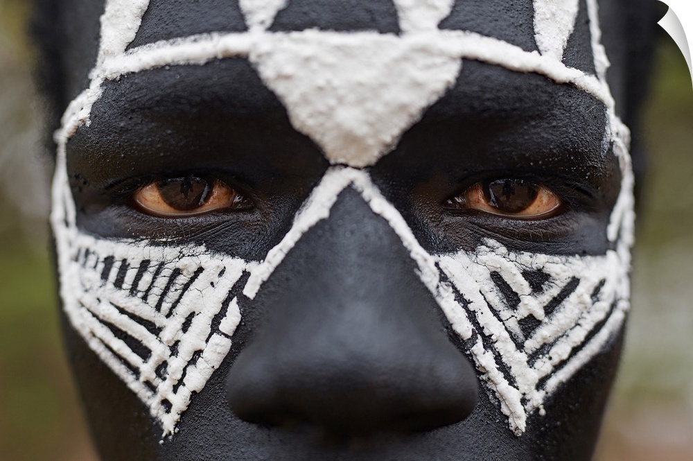 Close-up portrait of a Maasai warrior in the protected Ngorongoro area, Tanzania.