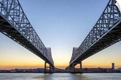 Crescent City Connection, twin span bridges over the Mississippi River at sunset