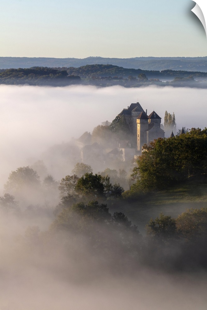 Curemonte labelled l'un des plus beaux villages de France, most beautiful villages in France, in the morning mist, Correze...