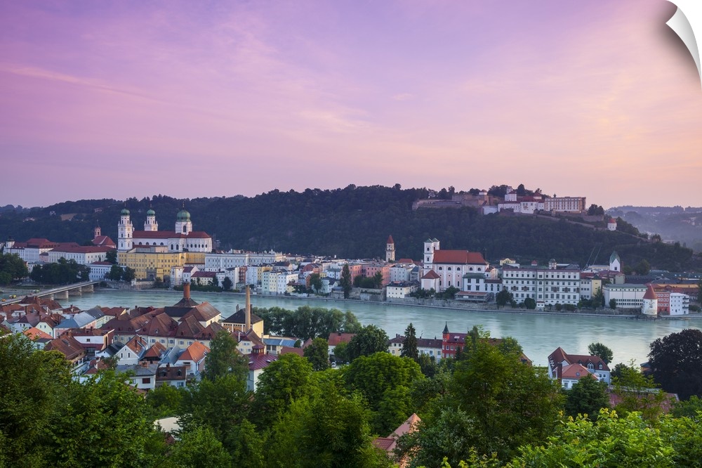 Elevated view over Old Town Passau and The River Danube illuminated at Dawn, Passau, Lower Bavaria, Bavaria, Germany.