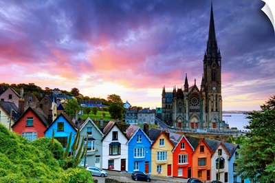 Europe, Ireland, Cork, Cobh Cathedral at colored houses at sunrise
